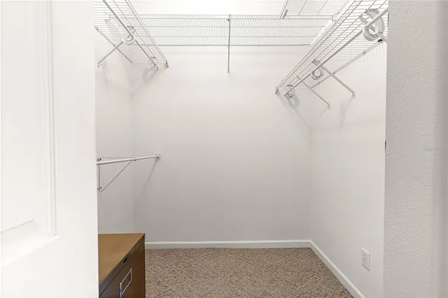 a view of small space with racks on the wall