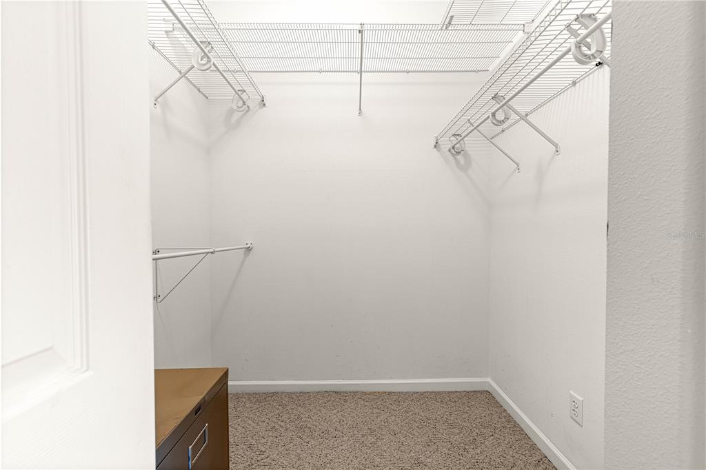 5543 Northwest 25th Loop Ocala, FL 34482 - Photo 19 of 50 a view of small space with racks on the wall