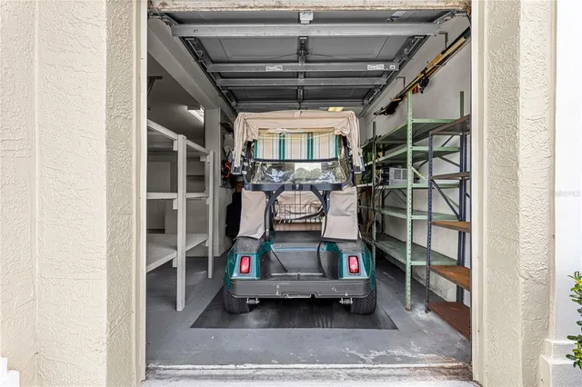 a view of a hallway with seating area