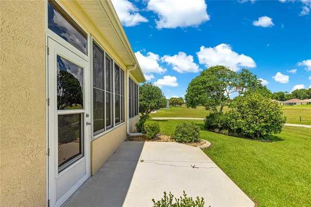 a view of a garden from a balcony