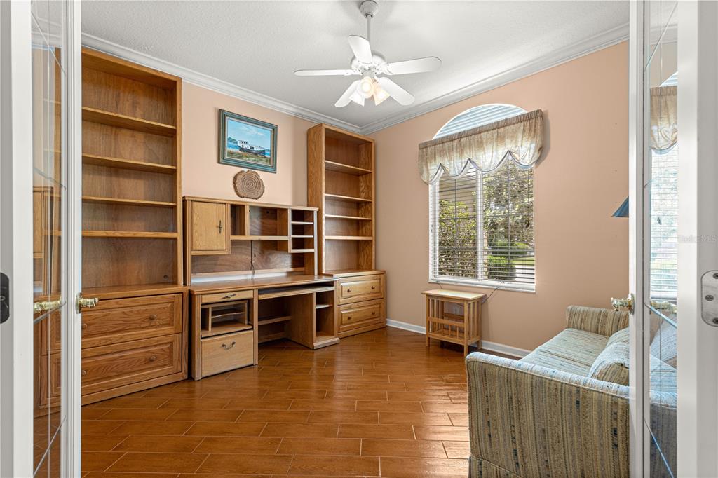 5543 Northwest 25th Loop Ocala, FL 34482 - Photo 5 of 50 a room with furniture and a window