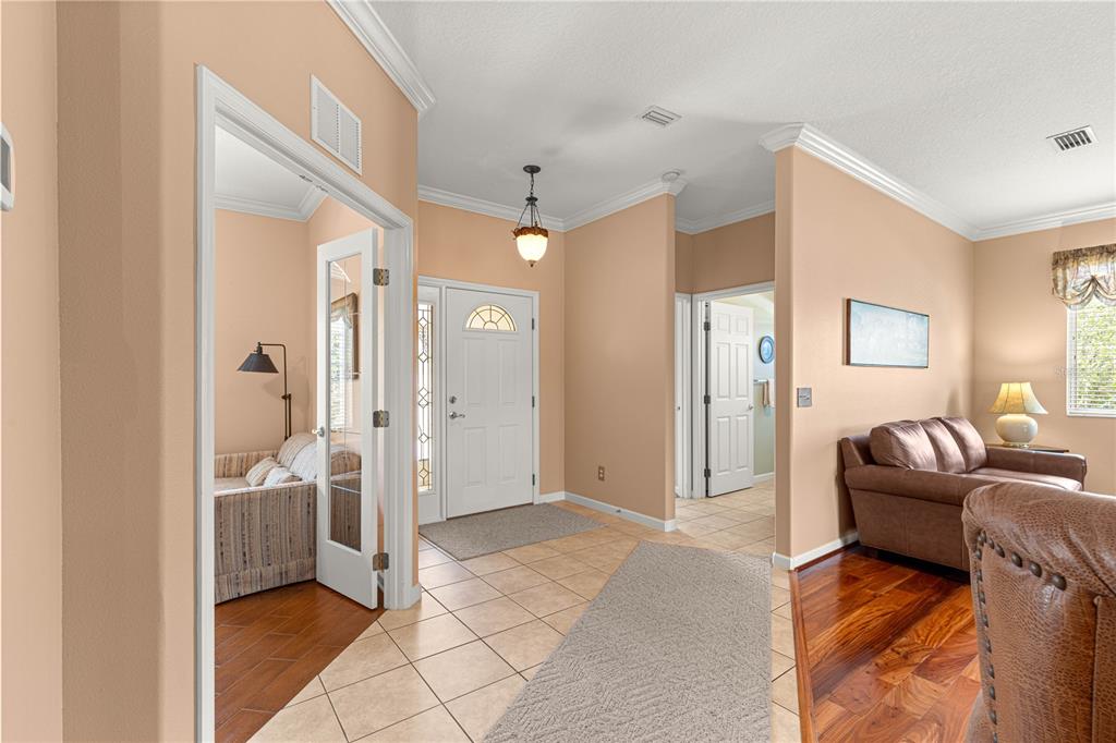 5543 Northwest 25th Loop Ocala, FL 34482 - Photo 8 of 50 a living room with furniture and a rug