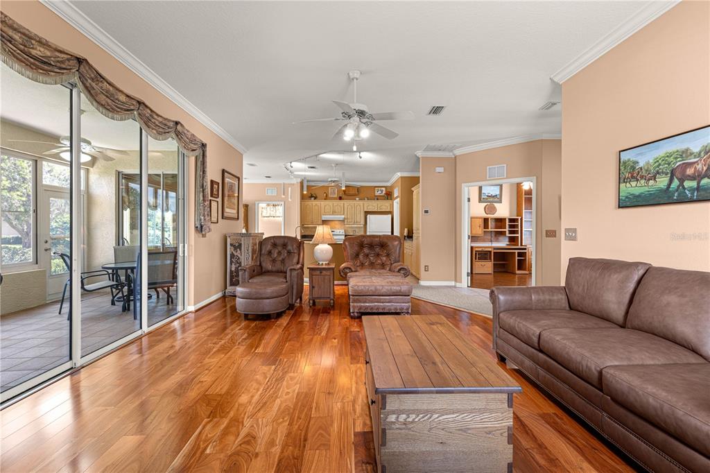 5543 Northwest 25th Loop Ocala, FL 34482 - Photo 10 of 50 a living room with furniture and a large window