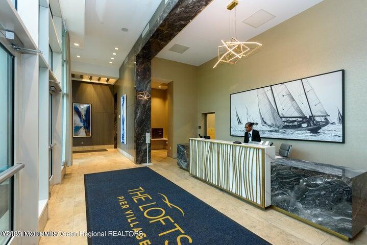 30 Melrose Terrace, Unit 201 Long Branch, NJ 07740 - Photo 15 of 33 a view of hallway with furniture and windows