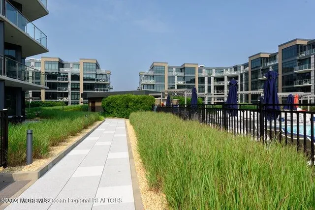 a view of building with garden space