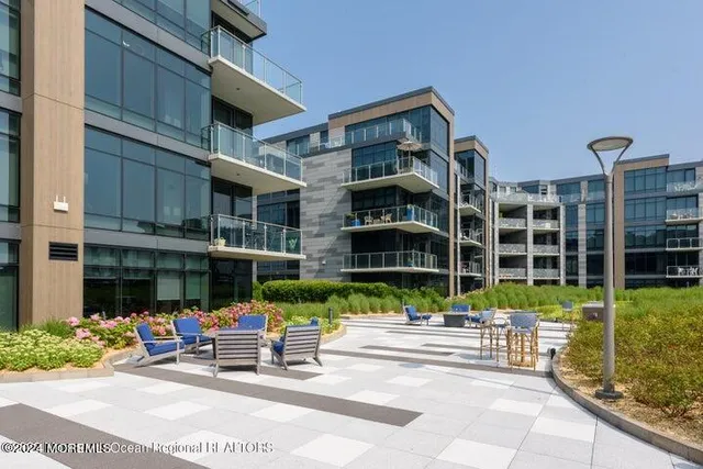 a view of a terrace with sitting area
