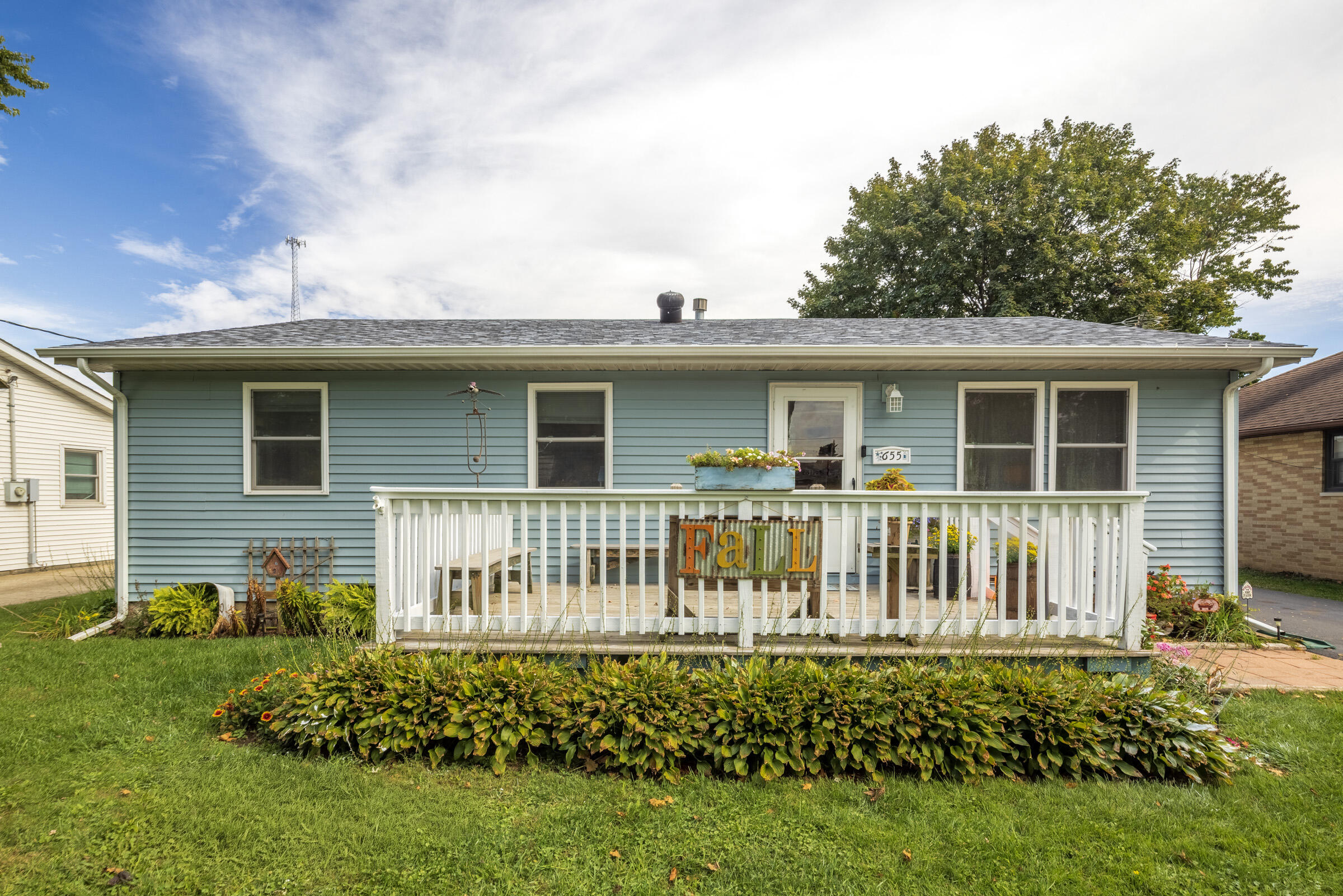655 Fairview Street Westville, IN 46391 - Photo 1 of 25 a front view of a house with a garden