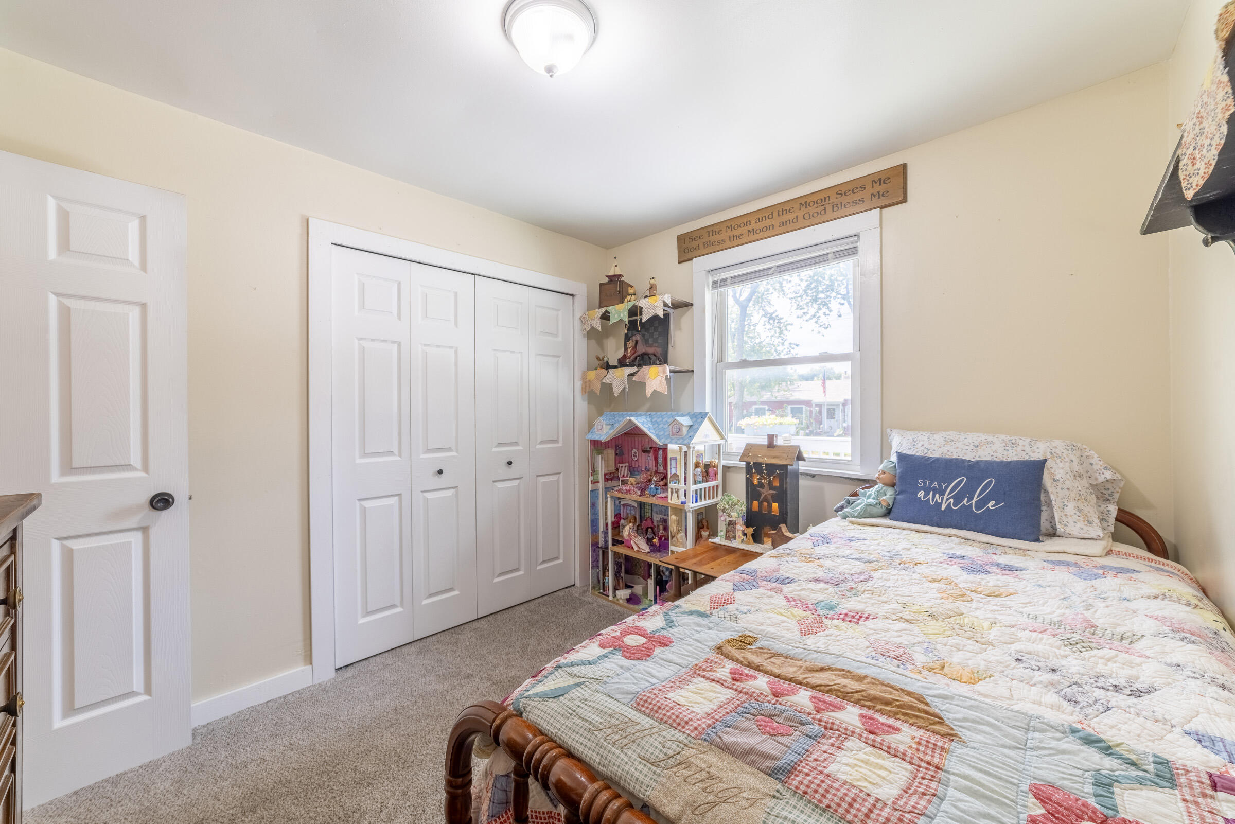 655 Fairview Street Westville, IN 46391 - Photo 15 of 25 a bed room with a bed and a chair