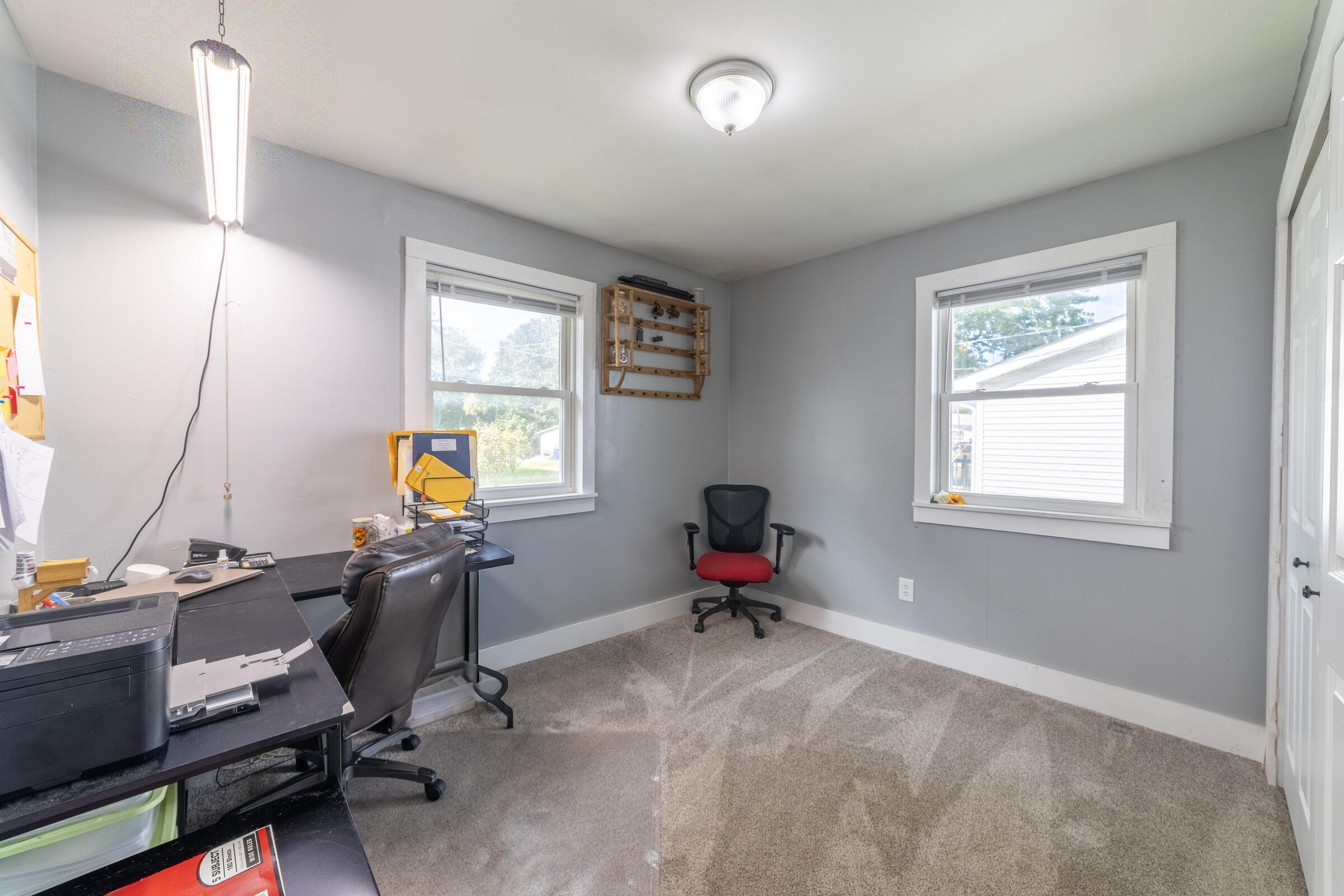 655 Fairview Street Westville, IN 46391 - Photo 16 of 25 a view of a workspace with furniture and a window