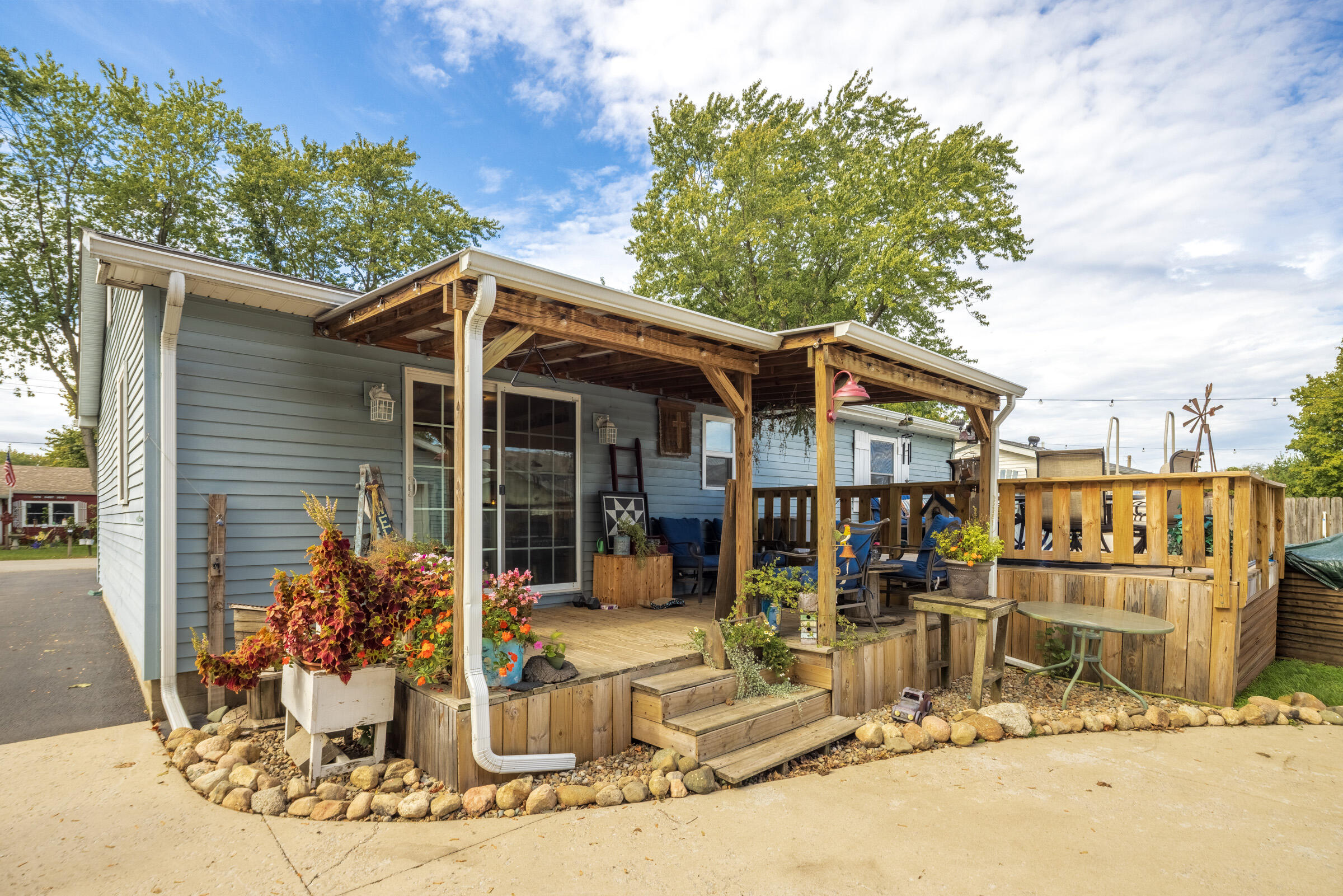 655 Fairview Street Westville, IN 46391 - Photo 22 of 25 a front view of a house with basket ball court and outdoor seating