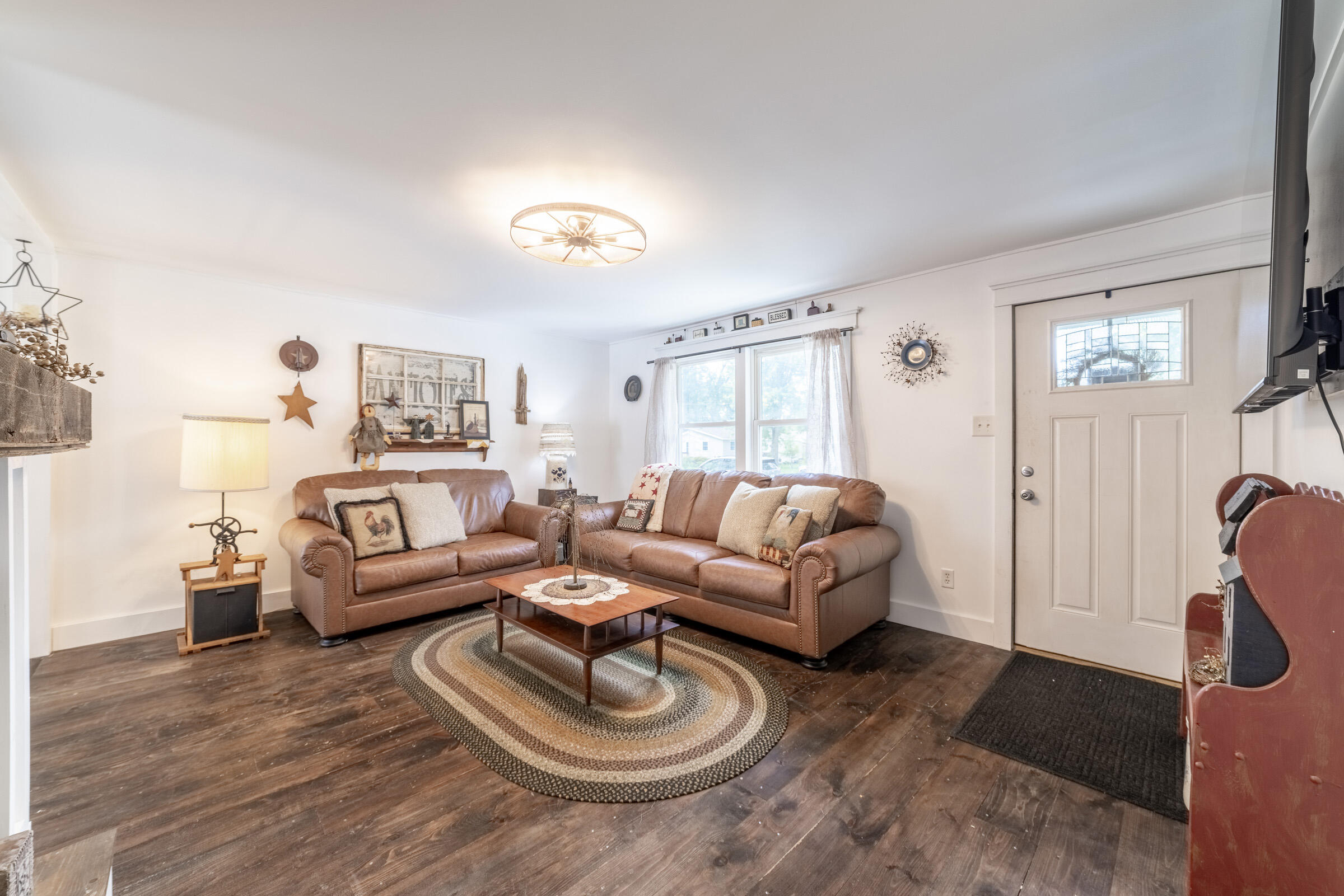 655 Fairview Street Westville, IN 46391 - Photo 5 of 25 a living room with furniture and a wooden floor