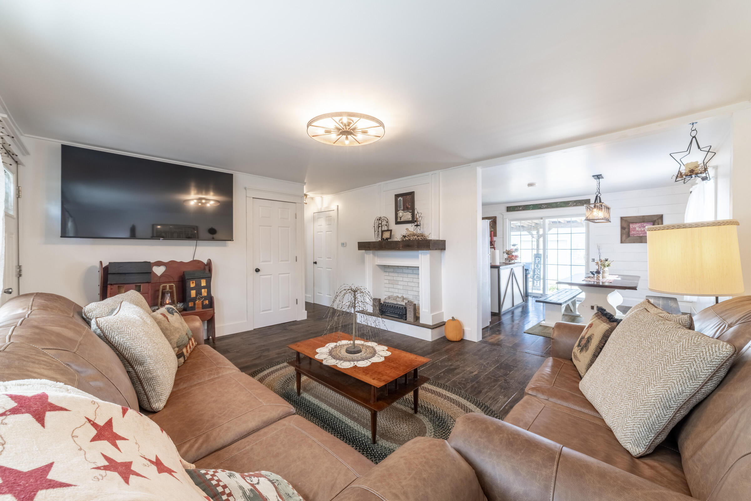 655 Fairview Street Westville, IN 46391 - Photo 6 of 25 a living room with furniture and a flat screen tv