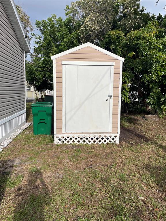 8640 Southwest 16th Court Davie, FL 33324 - Photo 16 of 16 a front view of a house with a yard