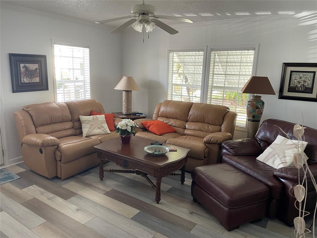 8640 Southwest 16th Court Davie, FL 33324 - Photo 2 of 16 a living room with furniture and a large window