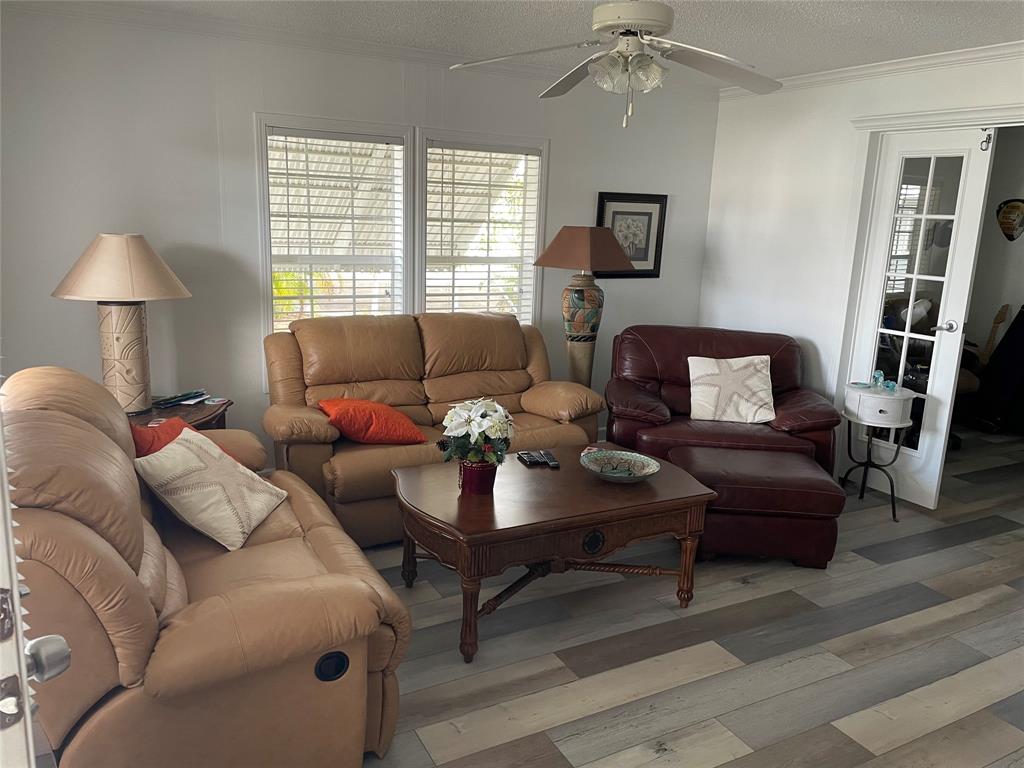 8640 Southwest 16th Court Davie, FL 33324 - Photo 3 of 16 a living room with furniture and a window