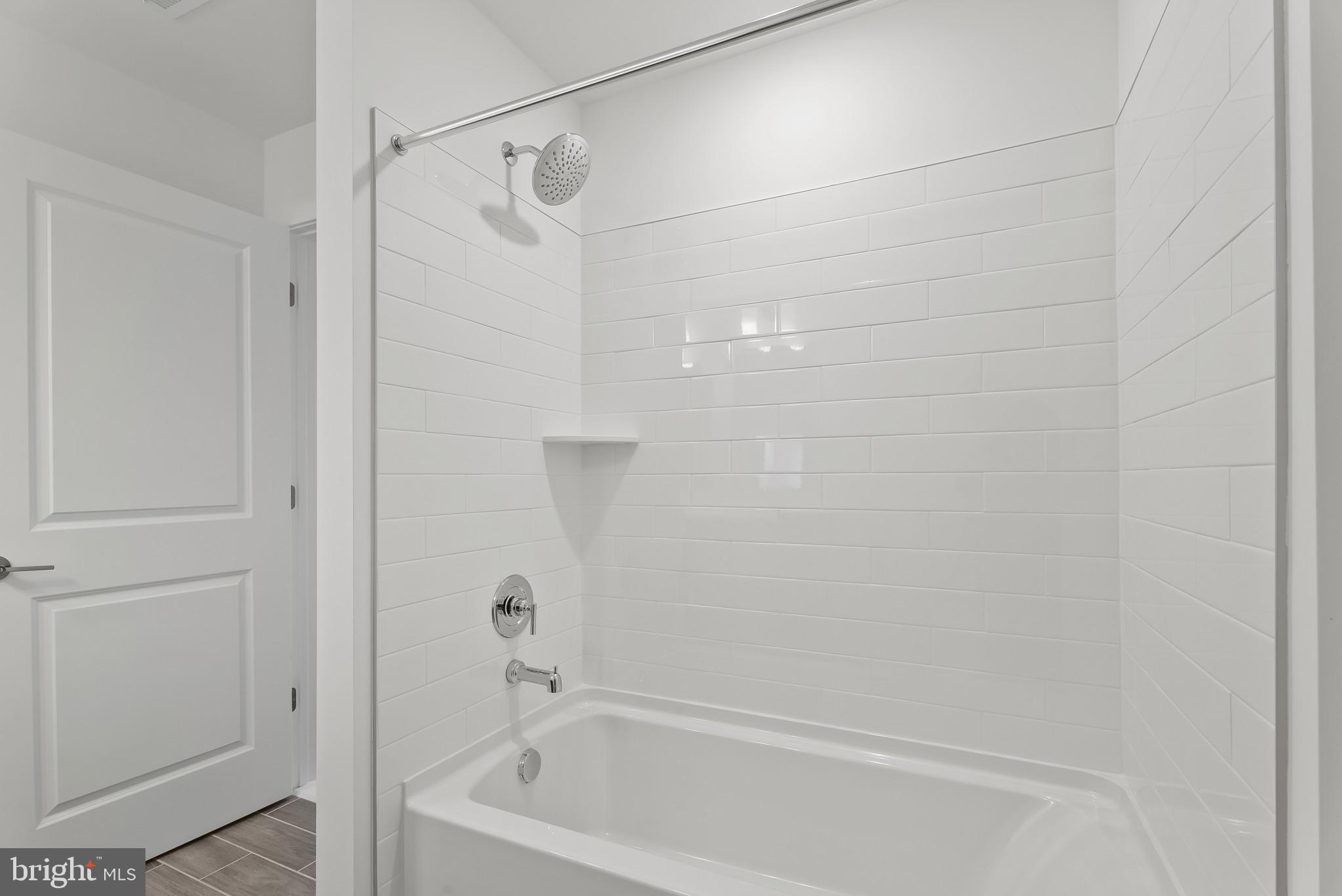 714 D Iron Frg Road Frederick, MD 21702 - Photo 40 of 47 a bathroom with a bathtub