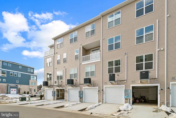 a front view of a building with street view