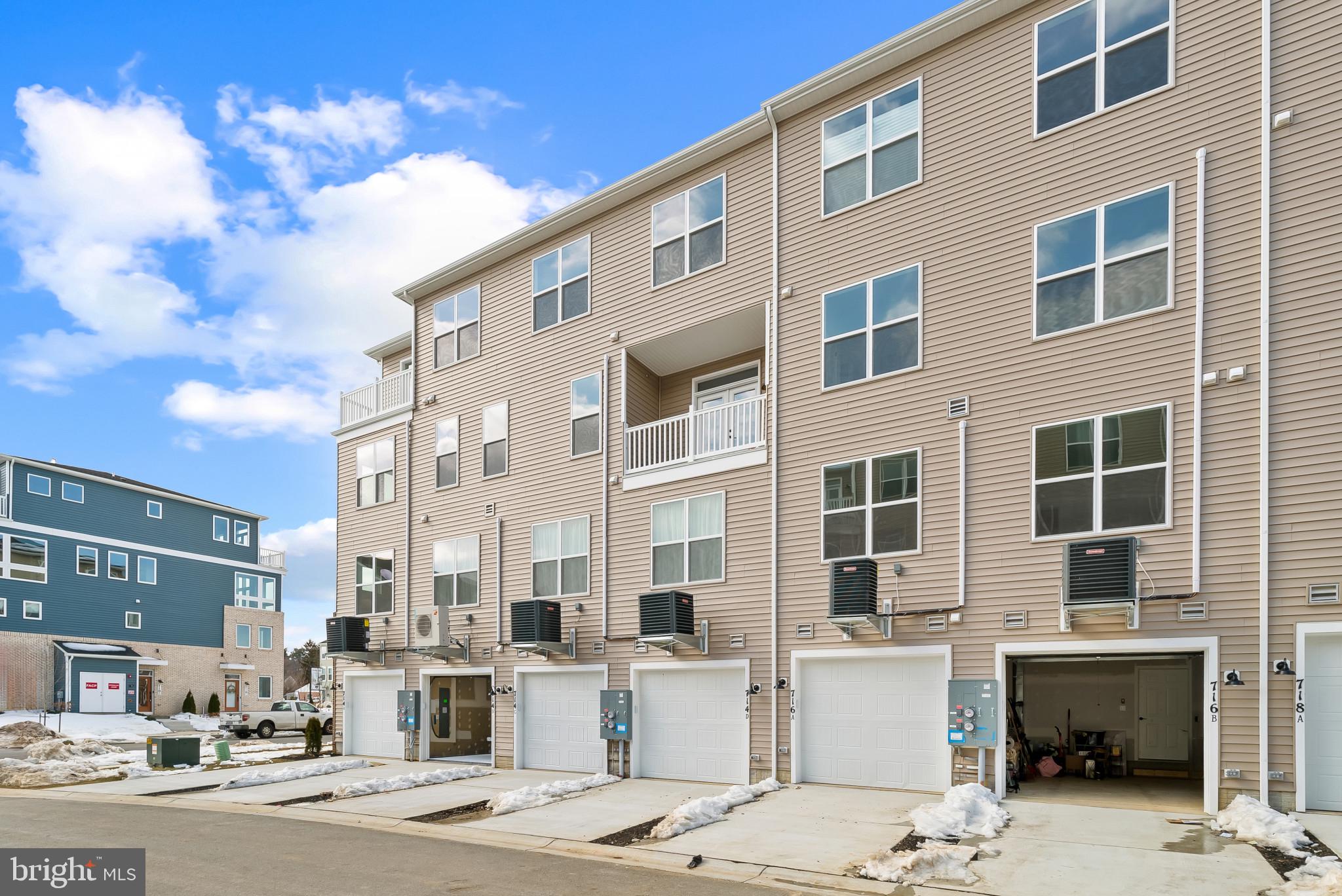 714 D Iron Frg Road Frederick, MD 21702 - Photo 45 of 47 a front view of a building with street view