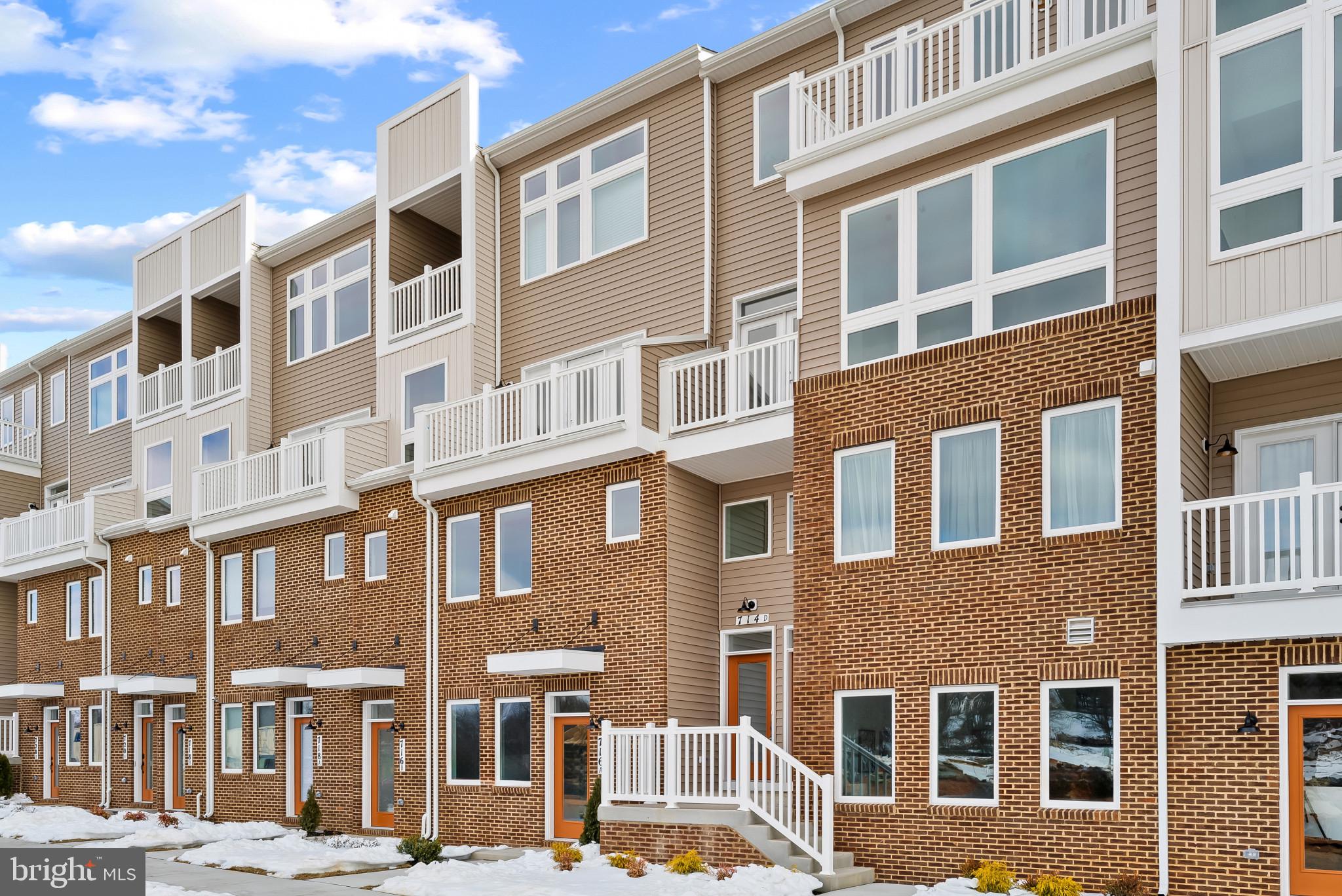 714 D Iron Frg Road Frederick, MD 21702 - Photo 47 of 47 a front view of a building with a lot of windows