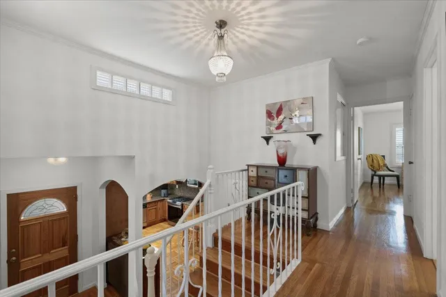 a view of entryway with wooden floor