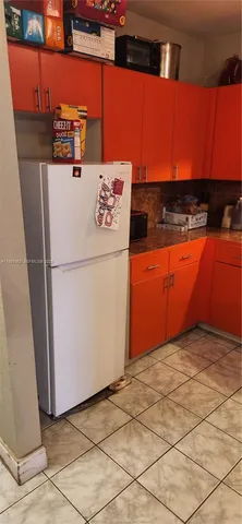 a utility room with washer and dryer