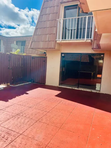 a view of backyard with a small cabin