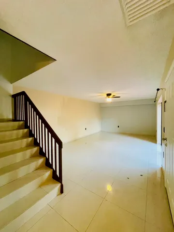 a view of a room with stairs