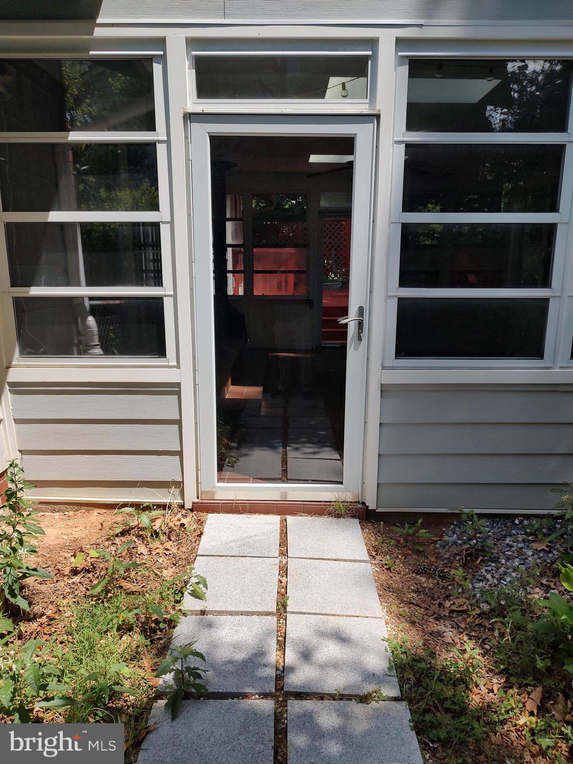 112 Claybrook Drive Silver Spring, MD 20902 - Photo 47 of 66 Exterior path leads to custom sun room.