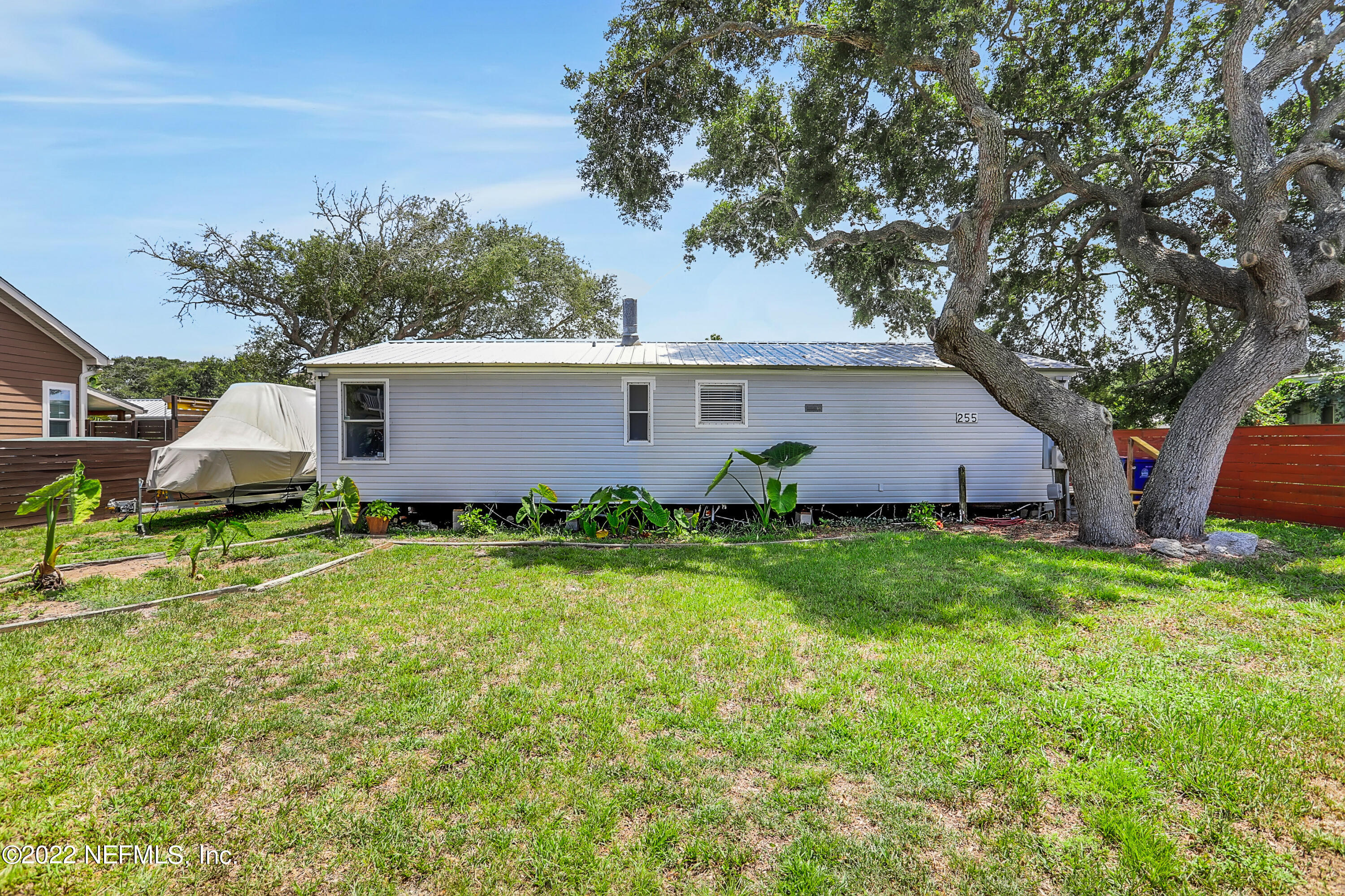 255 Villa Verda Road St. Augustine, FL 32080 - Photo 13 of 36 a view of a house with backyard and garden
