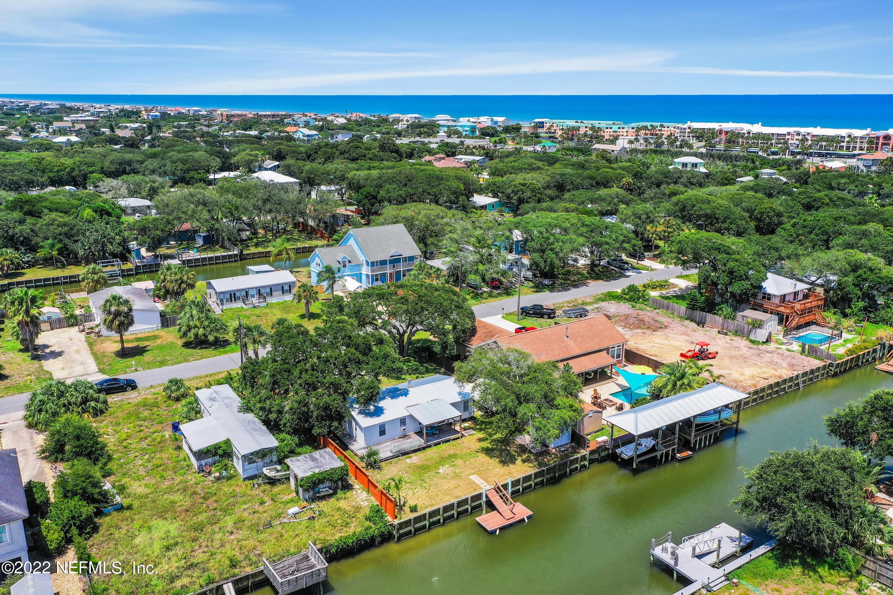 255 Villa Verda Road St. Augustine, FL 32080 - Photo 17 of 36 an aerial view of lake and residential houses with outdoor space