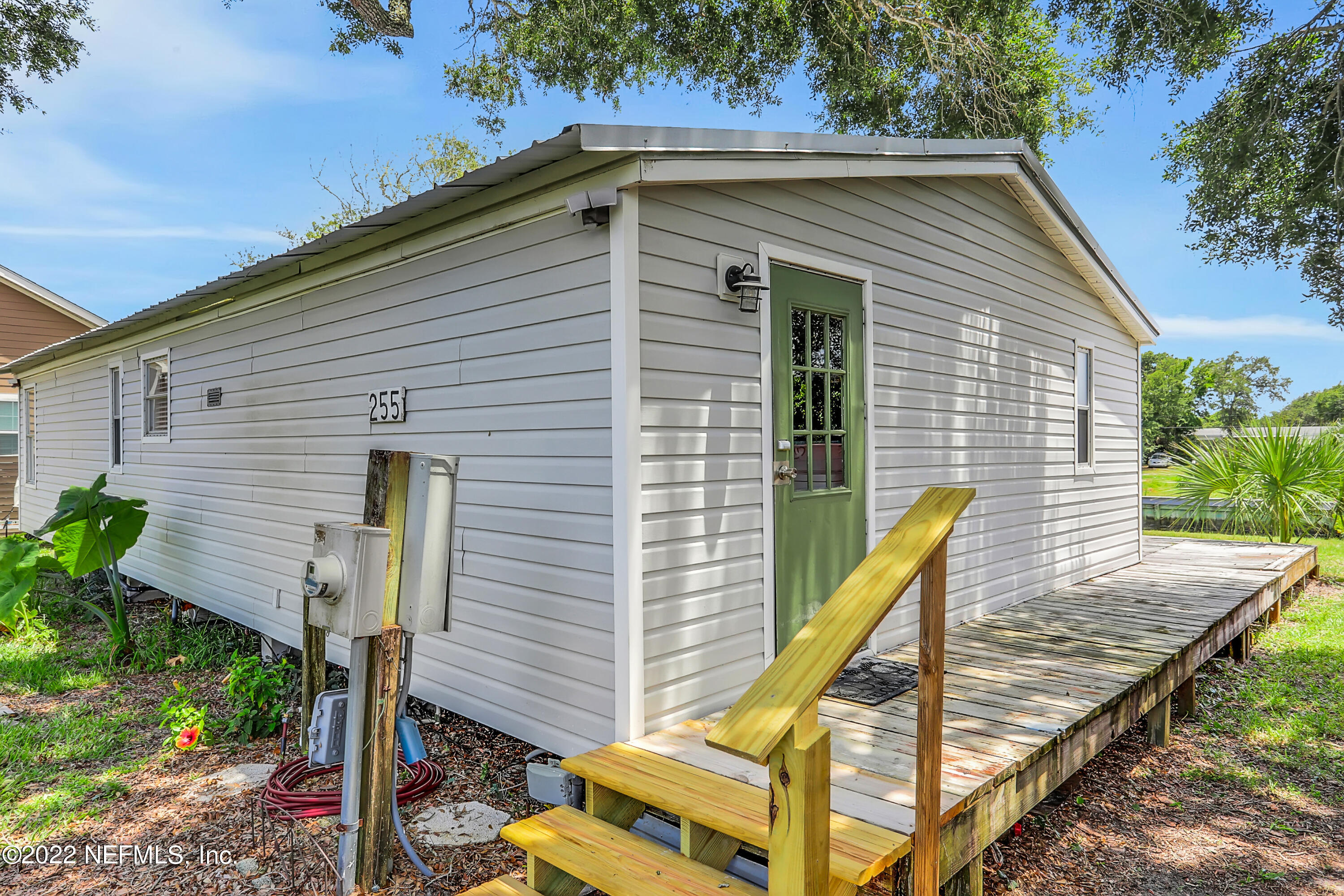 255 Villa Verda Road St. Augustine, FL 32080 - Photo 22 of 36 a view of a house with backyard and trees