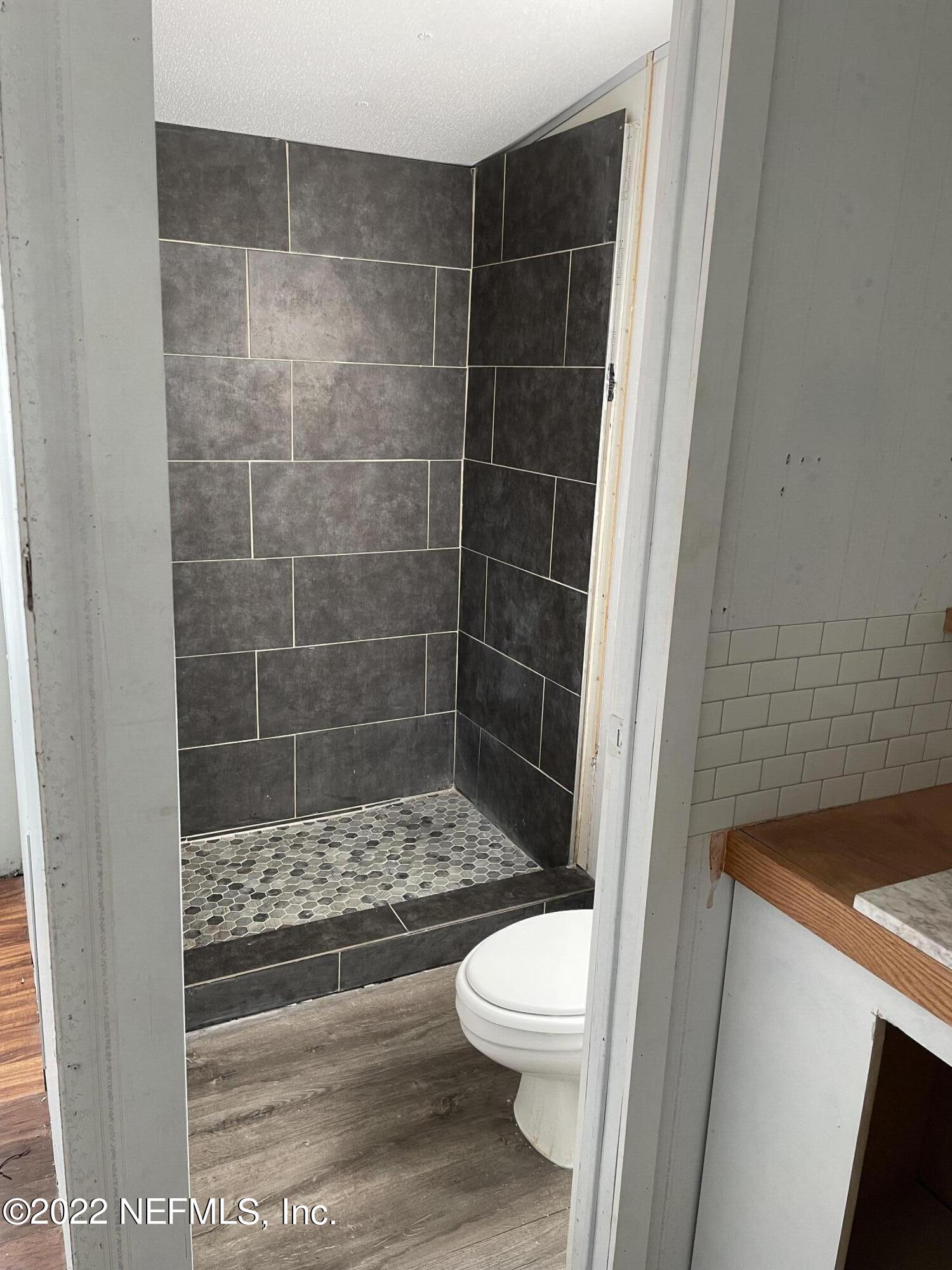255 Villa Verda Road St. Augustine, FL 32080 - Photo 34 of 36 a bathroom with a toilet and a shower