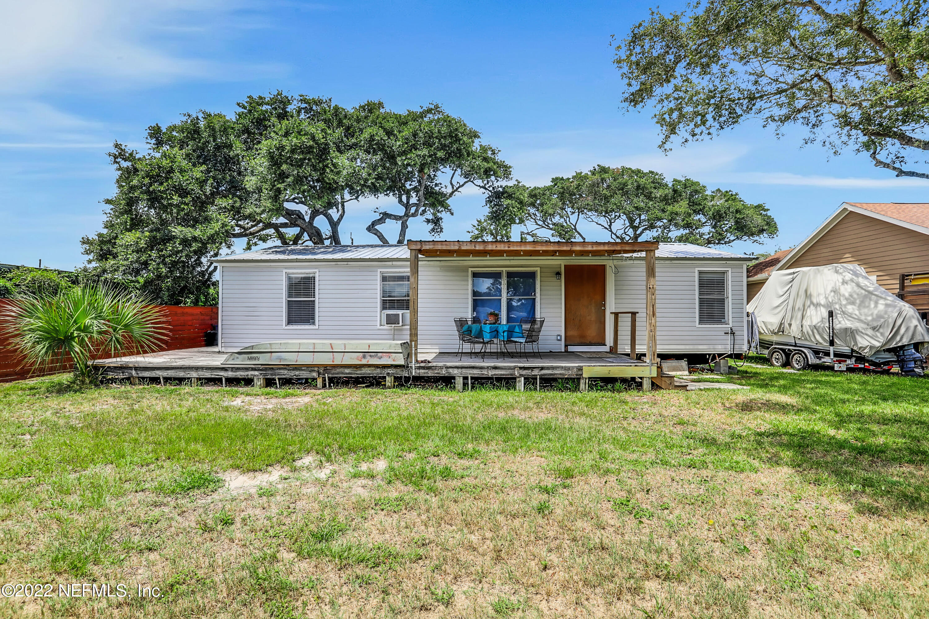 255 Villa Verda Road St. Augustine, FL 32080 - Photo 5 of 36 a backyard of a house with seating space