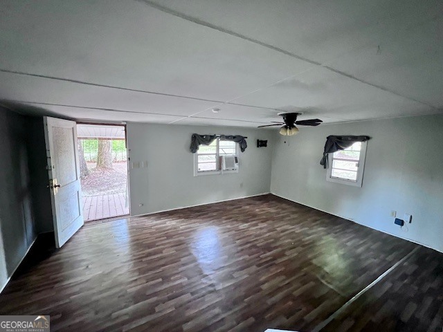 3195 Henderson Grove Road Sandersville, GA 31082 - Photo 30 of 50 an empty room with wooden floor and windows