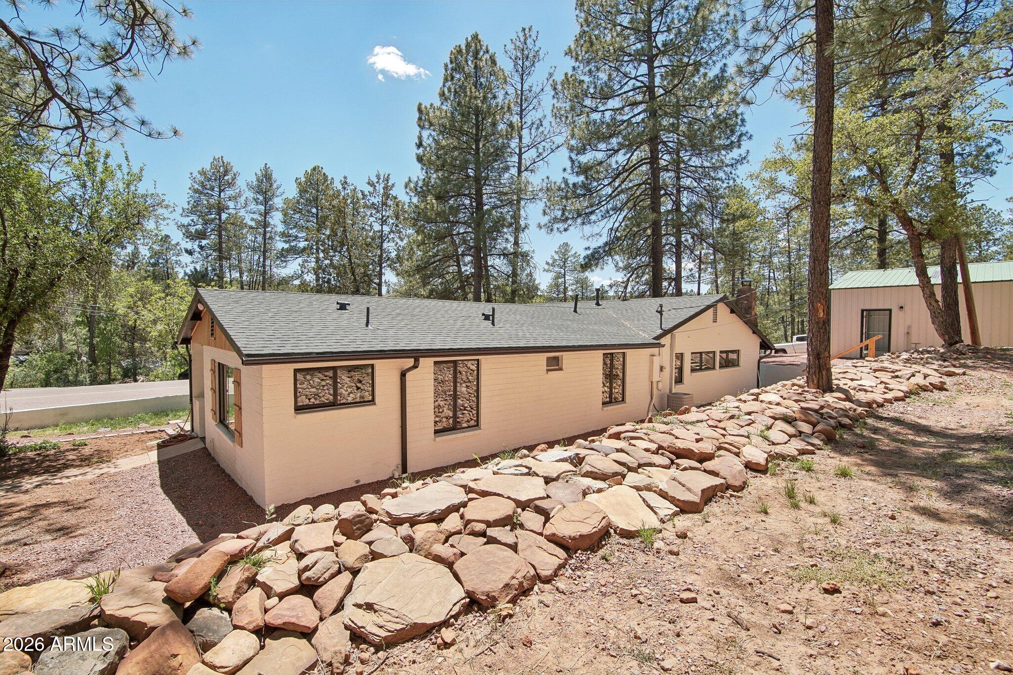 8324 Fossil Creek Road Pine, AZ 85544 - Photo 27 of 29 a view of a backyard of the house