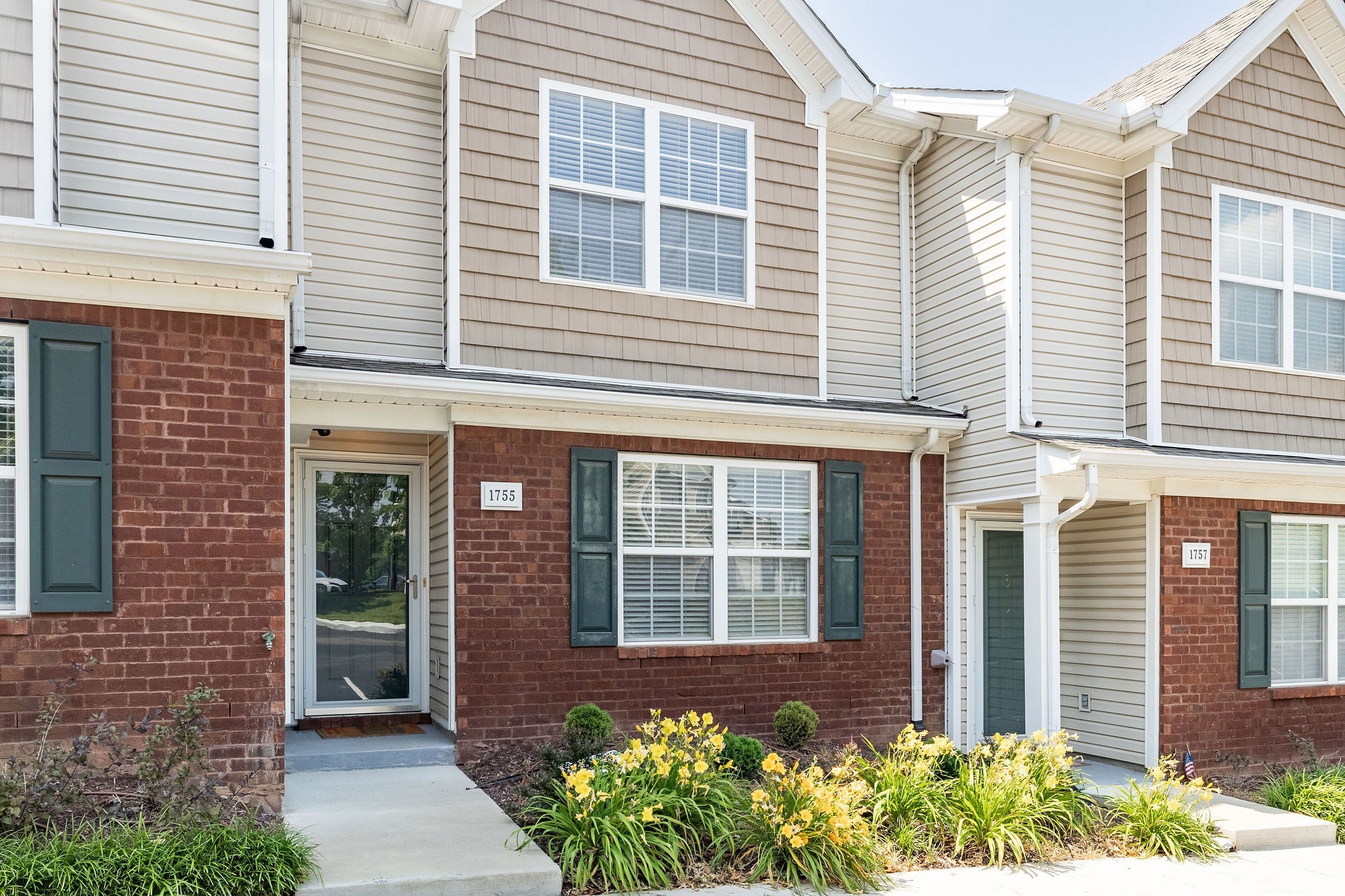 1755 Red Jacket Drive Antioch, TN 37013 - Photo 32 of 37 a front view of a brick house many windows