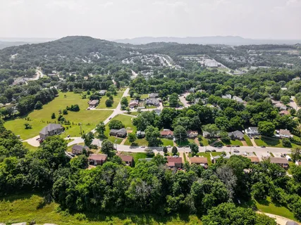 an aerial view of a city with lots of residential buildings