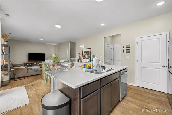 a view of kitchen center island and living room