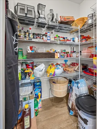a store room with lots of clutter and storage