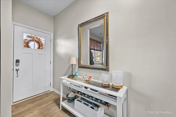 a room with furniture and a mirror