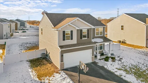a view of a street with wooden house