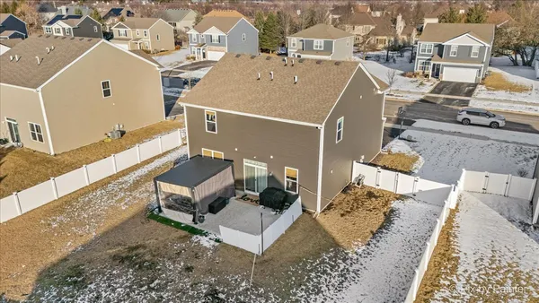 an aerial view of a house with a garden