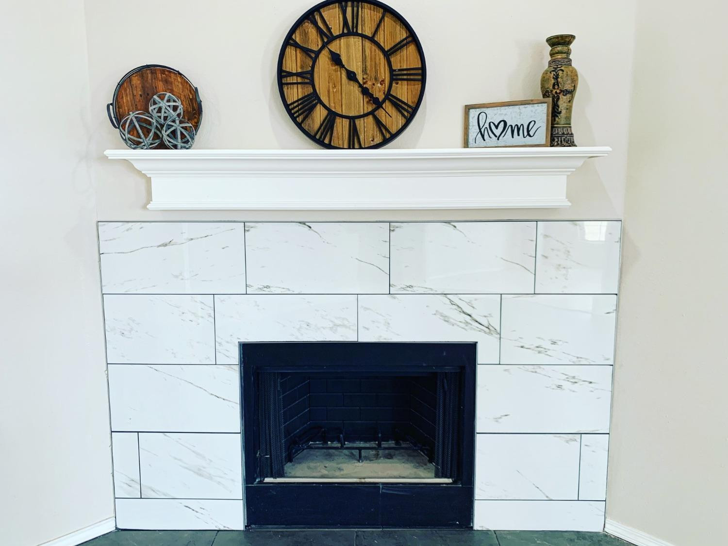 9807 Juneau Avenue Lubbock, TX 79424 - Photo 3 of 22 a closeup of a fireplace