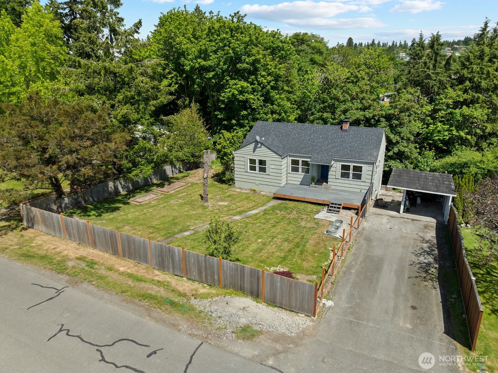 307 4th Street Steilacoom, WA 98388 - Photo 34 of 39 a view of a swimming pool with a patio