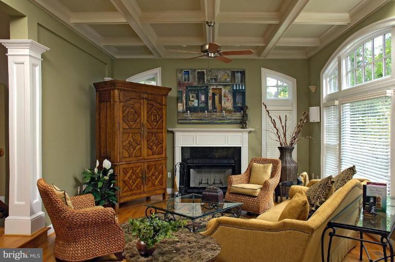 7105 Exfair Road Bethesda, MD 20814 - Photo 3 of 24 a living room with furniture and a fireplace