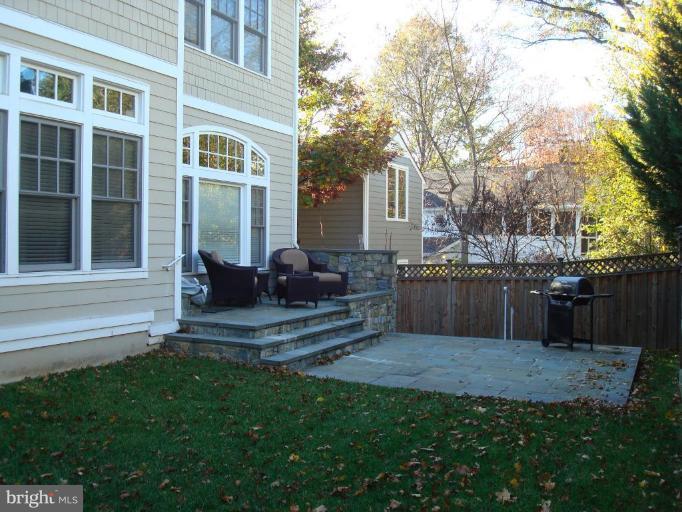 7105 Exfair Road Bethesda, MD 20814 - Photo 22 of 24 a swimming pool with outdoor seating and yard