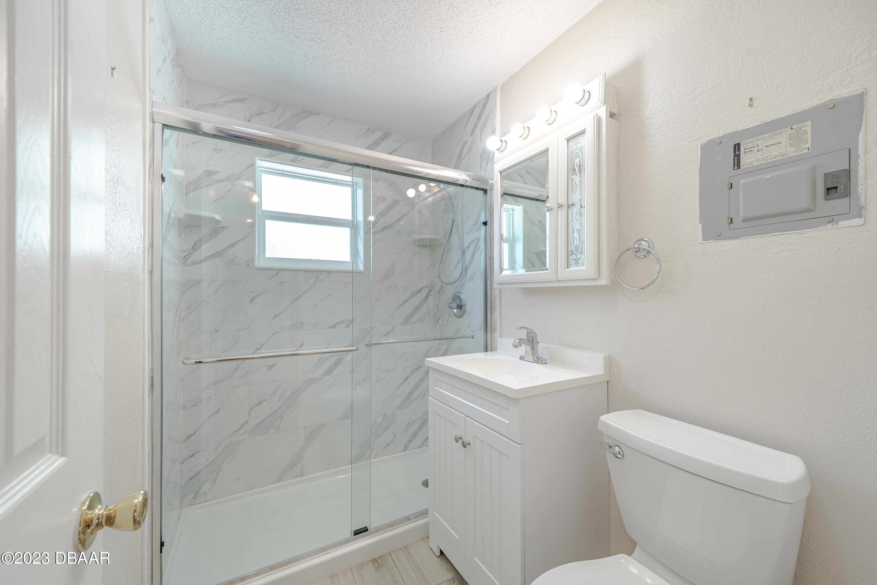 19 Rivershore Drive Ormond Beach, FL 32176 - Photo 17 of 38 a bathroom with a toilet sink and mirror