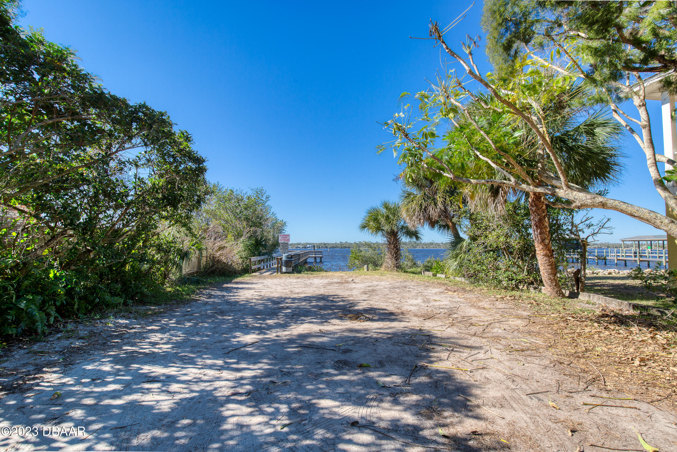 19 Rivershore Drive Ormond Beach, FL 32176 - Photo 36 of 38 a backyard of a house with lots of green space