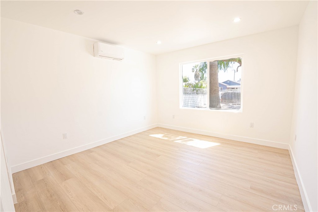 13003 Kamloops Street Pacoima, CA 91331 - Photo 15 of 66 a view of an empty room with a window