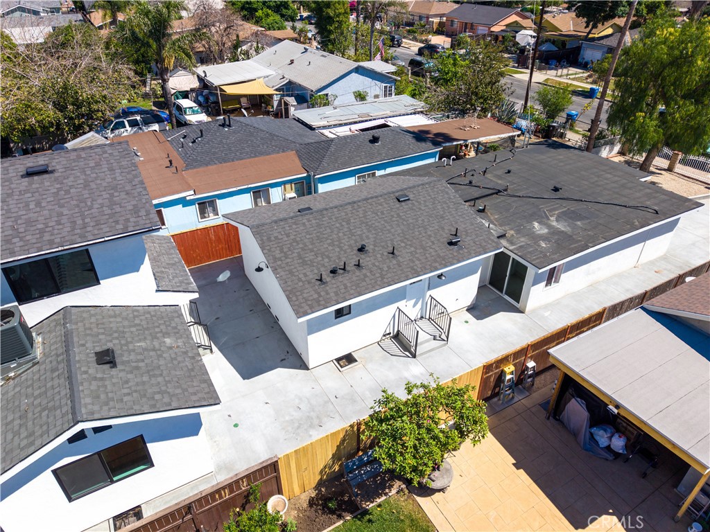 13003 Kamloops Street Pacoima, CA 91331 - Photo 64 of 66 an aerial view of residential houses with outdoor space